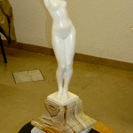 Art Nouveau sculpture of a female nude.