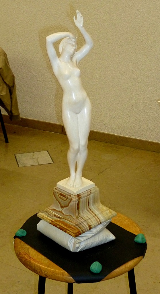 Art Nouveau sculpture of a female nude.